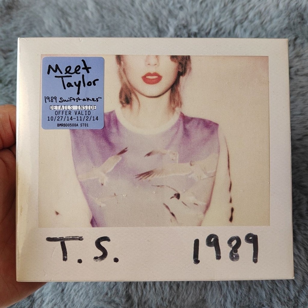 Taylor Swift's album CD contains 13 copies of Polaroid | Shopee Singapore
