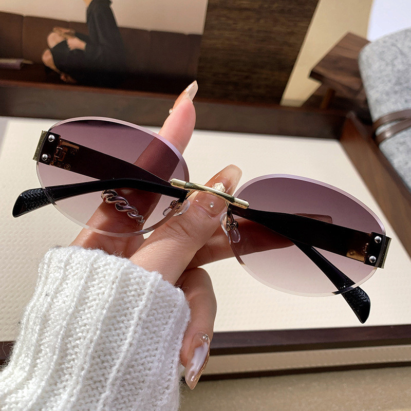 Metal Wide-Leg Oval Sunglasses Ladies High-End Rimless Rice Nail ...