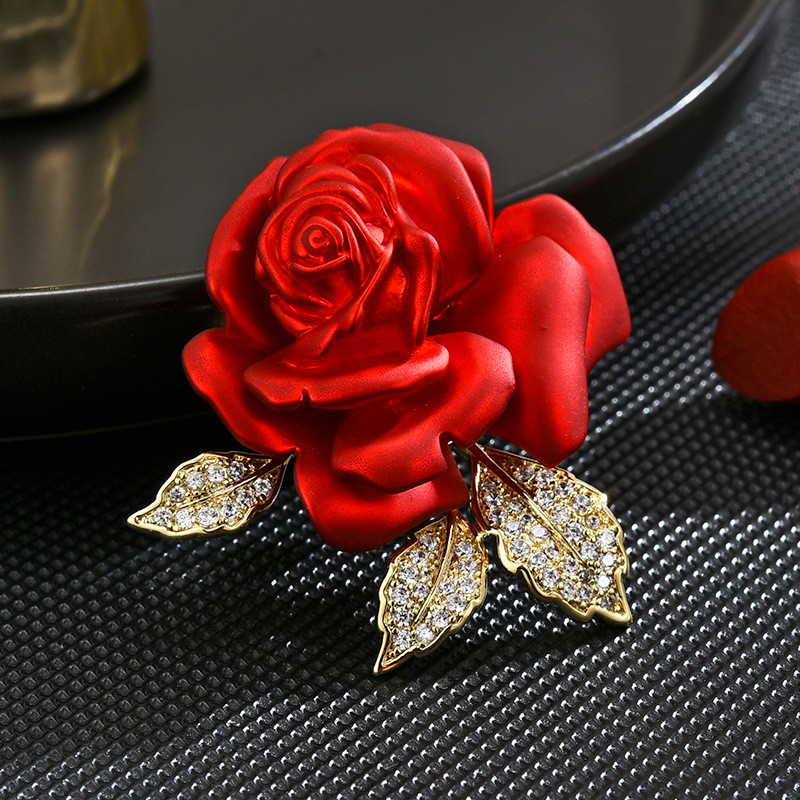 Red corsage brooch deals