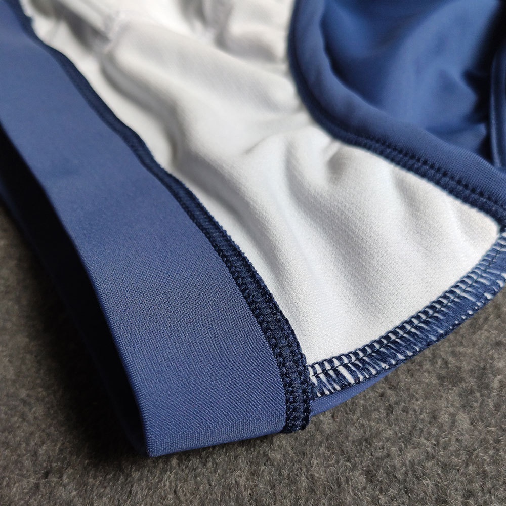 QUESHARK Mens Simple Color Matching Triangle Swimming Trunks With Push ...