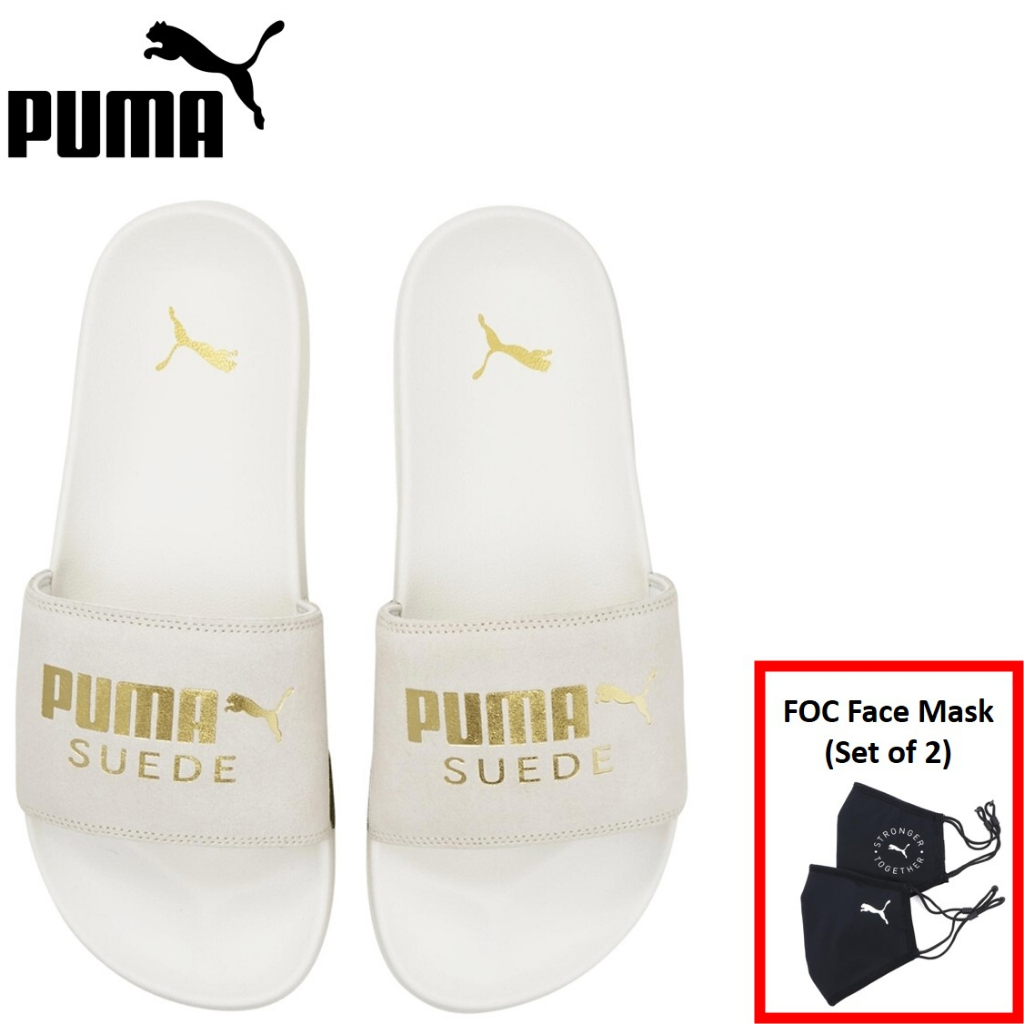 All white store puma slides