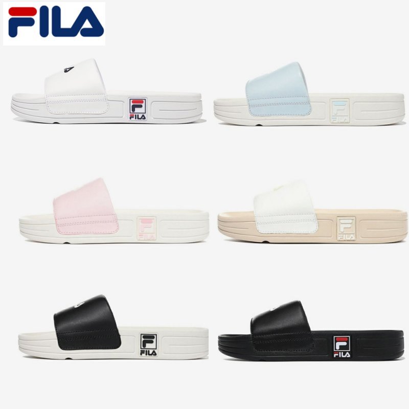 White and store gold fila slides