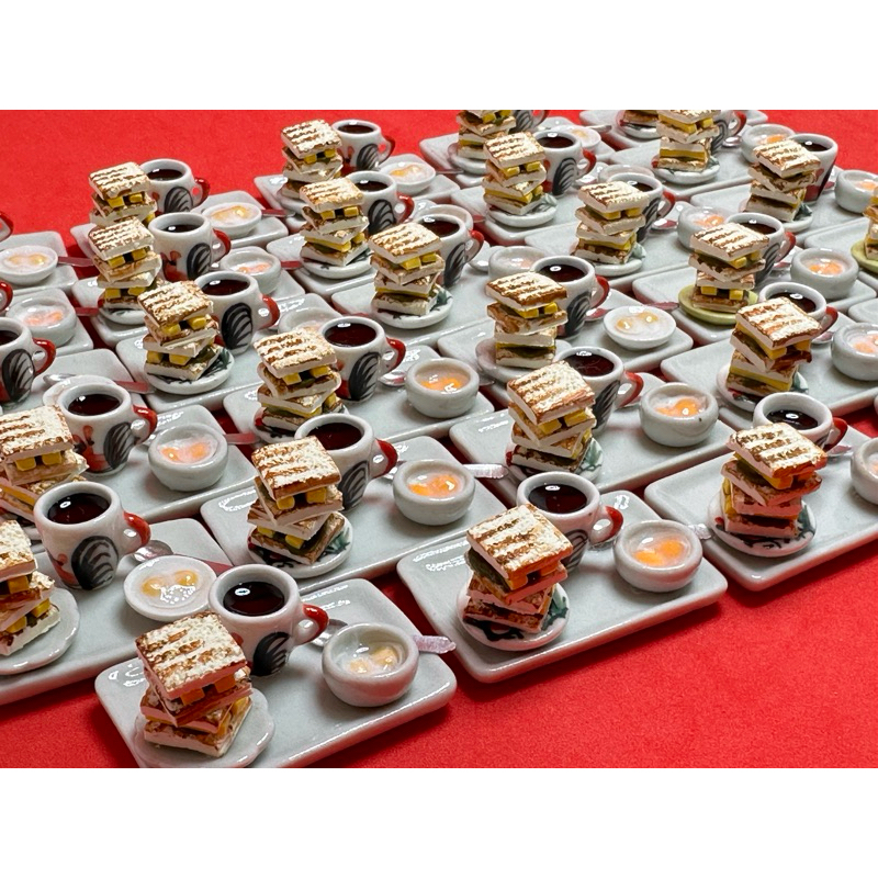 Handmade Miniature Kaya Toast with butter, soft boiled eggs and black ...