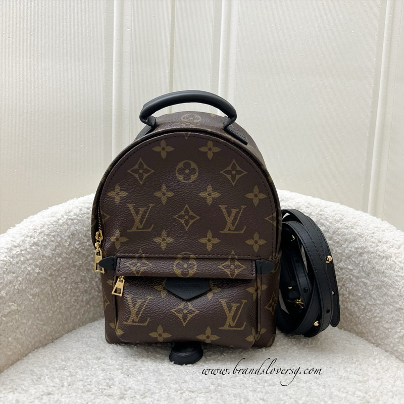 Pre loved LV Palm Springs Mini Backpack in Monogram Canvas and GHW