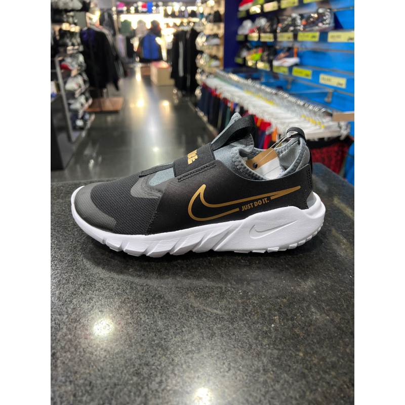 Nike flex outlet black and gold