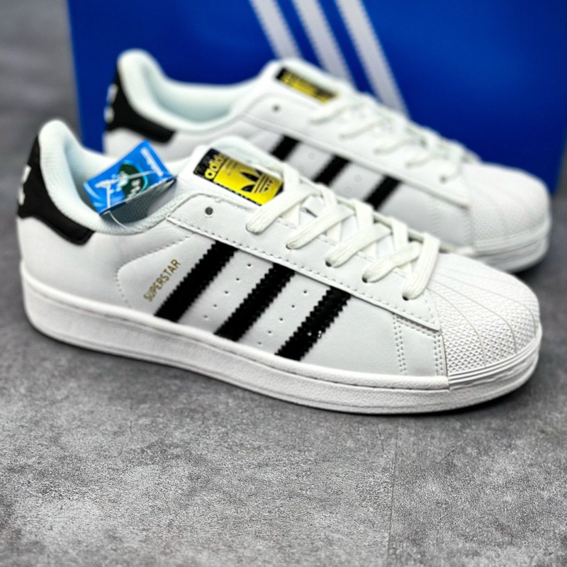 adidas black shell toe mens