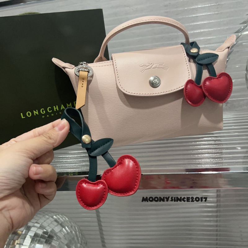 Longchamp bag charm best sale