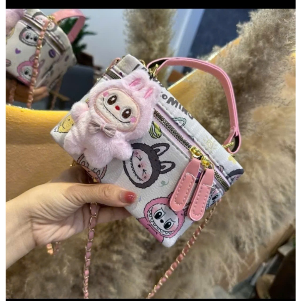 Labuu crossbody bag comes with a labubu bear hook that fits a phone ...